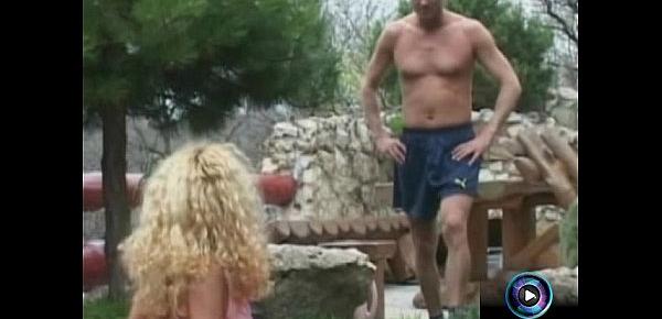  Curly haired blonde Jaqueline Stone giving a wet blowjob outdoors